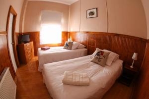 Voodi või voodid majutusasutuse Hotel Albatros toas