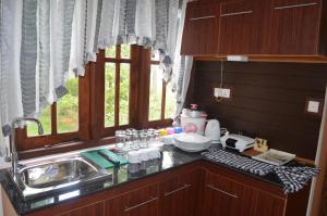 Kuchyň nebo kuchyňský kout v ubytování Aroma Villa Homestay