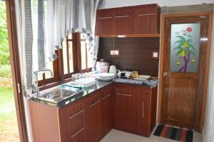 Kuchyň nebo kuchyňský kout v ubytování Aroma Villa Homestay