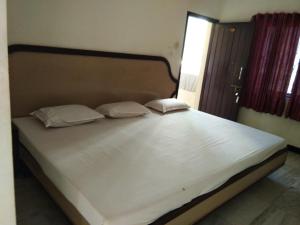 Cama o camas de una habitación en Hotel John