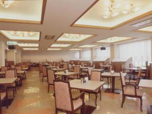 Um restaurante ou outro lugar para comer em Toya Kanko Hotel