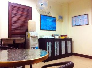 TV a/nebo společenská místnost v ubytování T.P. Place Hotel