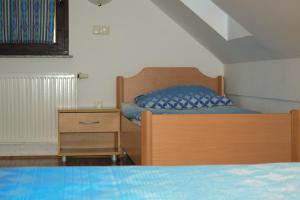 Postel nebo postele na pokoji v ubytování Farm Stay Zevnik