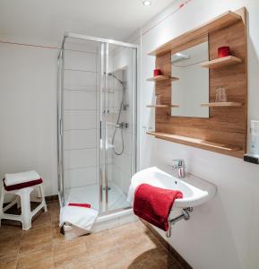Ett badrum på Appartementhaus Speckalm