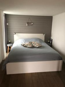 Cama o camas de una habitación en Beach Break Zandvoort
