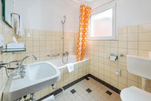 Koupelna v ubytování Hotel Rhodania