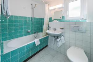 Koupelna v ubytování Hotel Rhodania