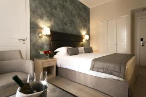 Postel nebo postele na pokoji v ubytování Thermae Sylla Spa & Wellness Hotel