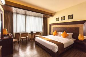 Tempat tidur dalam kamar di Hotel Mystic Mountain