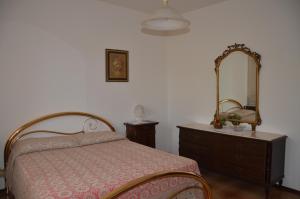 Een bed of bedden in een kamer bij La Rinascita