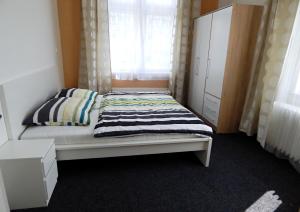 Cama o camas de una habitación en Apartments Ostrava Vítkovice