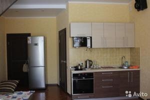 Кухня или мини-кухня в Бунгало на Солнечной 40-1 