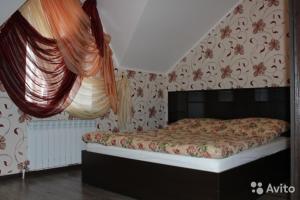 Кровать или кровати в номере Бунгало на Солнечной 40-1