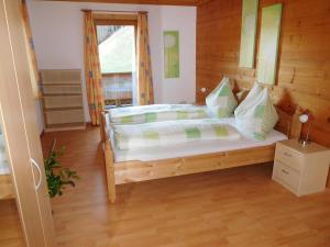 Posteľ alebo postele v izbe v ubytovaní Apartment Aschaber
