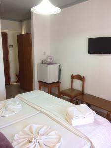 Кровать или кровати в номере Sea Breeze Hotel