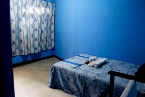 Postel nebo postele na pokoji v ubytování J hostel kandy