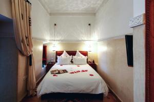 Postel nebo postele na pokoji v ubytování Riad Dar Justo Hotel Boutique & Spa