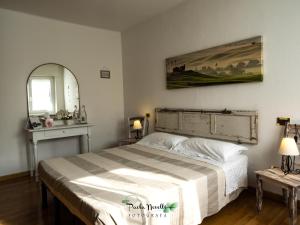 Postel nebo postele na pokoji v ubytování Bed and Breakfast AnnA