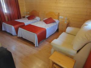 Posteľ alebo postele v izbe v ubytovaní Motel San Isidro