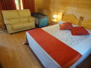 Posteľ alebo postele v izbe v ubytovaní Motel San Isidro