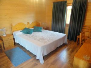 Posteľ alebo postele v izbe v ubytovaní Motel San Isidro