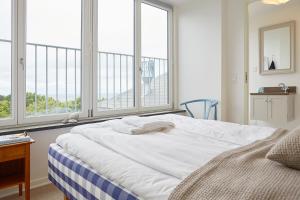 Postel nebo postele na pokoji v ubytování Gilleleje Badehotel