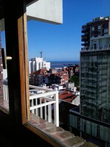 a view of a city from a window at Panoramico Playa Grande -Solo Familias in Mar del Plata