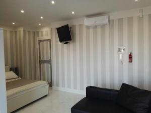 TV a/nebo společenská místnost v ubytování B&B Pescara Centro Luxury Suite