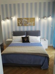 Postel nebo postele na pokoji v ubytování B&B Pescara Centro Luxury Suite