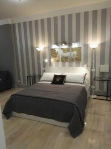 Postel nebo postele na pokoji v ubytování B&B Pescara Centro Luxury Suite