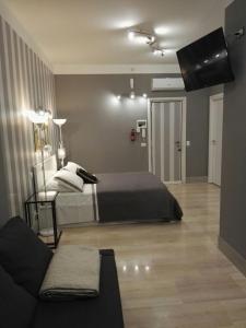 Postel nebo postele na pokoji v ubytování B&B Pescara Centro Luxury Suite