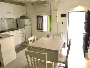A kitchen or kitchenette at Santi Apostoli Apartment