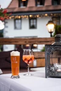 Nápoje v ubytování Romantik Hôtel l'Etoile