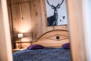 Postel nebo postele na pokoji v ubytování Romantik Hôtel l'Etoile