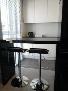 Kuchnia lub aneks kuchenny w obiekcie Apartament na Złotej