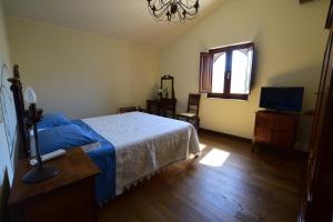 Postel nebo postele na pokoji v ubytování Agriturismo Trappeto Vecchio + 37 fotografií