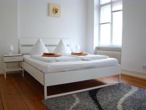 Voodi või voodid majutusasutuse Rooms & Apartments near Zoologischer Garten toas