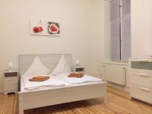 Voodi või voodid majutusasutuse Rooms & Apartments near Zoologischer Garten toas