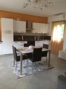 Kuchyň nebo kuchyňský kout v ubytování Casa Sammo