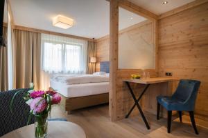 Giường trong phòng chung tại Hotel Garni Glockenstuhl
