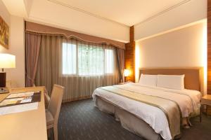 Katil atau katil-katil dalam bilik di Hoya Hot Springs Resort & Spa