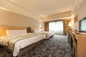 Katil atau katil-katil dalam bilik di Hoya Hot Springs Resort & Spa