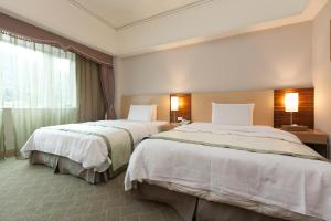 Katil atau katil-katil dalam bilik di Hoya Hot Springs Resort & Spa