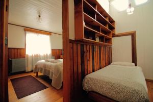 Postel nebo postele na pokoji v ubytování Hotel Mi Casa