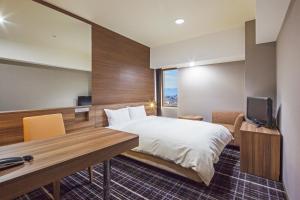 TV a/nebo společenská místnost v ubytování Kofu Kinenbi Hotel