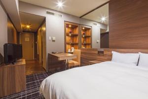 TV a/nebo společenská místnost v ubytování Kofu Kinenbi Hotel