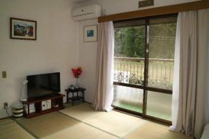 TV a/nebo společenská místnost v ubytování Hotel Otani