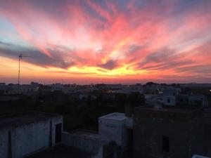 The sunrise or sunset as seen from a vendégházakat or nearby