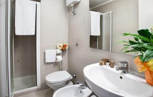 Koupelna v ubytování Hotel Gamma