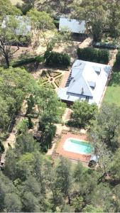 an aerial view of a house with a swimming pool at Thulanathi - Rest Explore Reconnect in Pokolbin